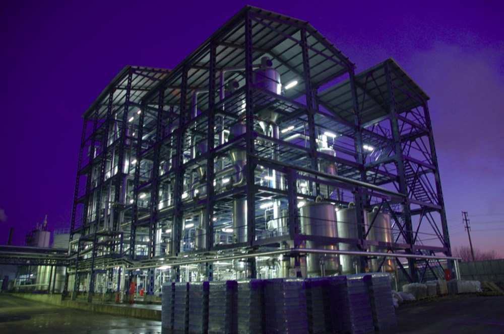 Biodiesel production plant illuminated at night